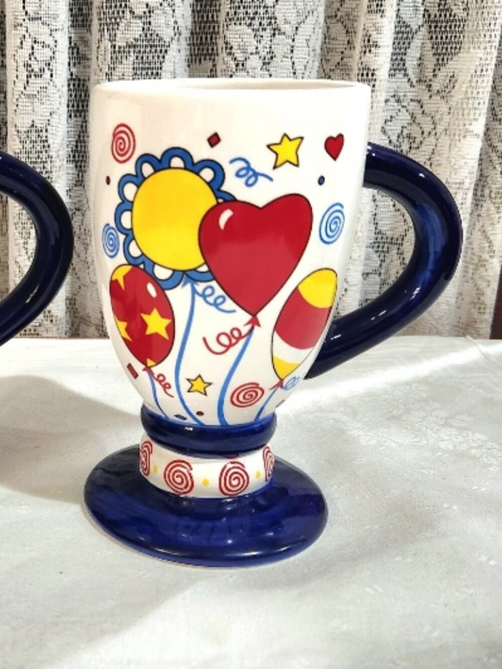 2 White Whimsical Mugs w/ Navy Handle and Base w/ Red, Blue and Yellow Balloons